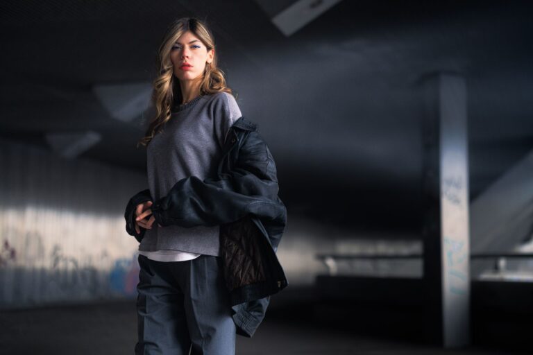 The Oversized Shirt Jacket Is Quietly Edging Out the Trench Coat Person wearing an oversized shirt jacket as an outer layer on a city street