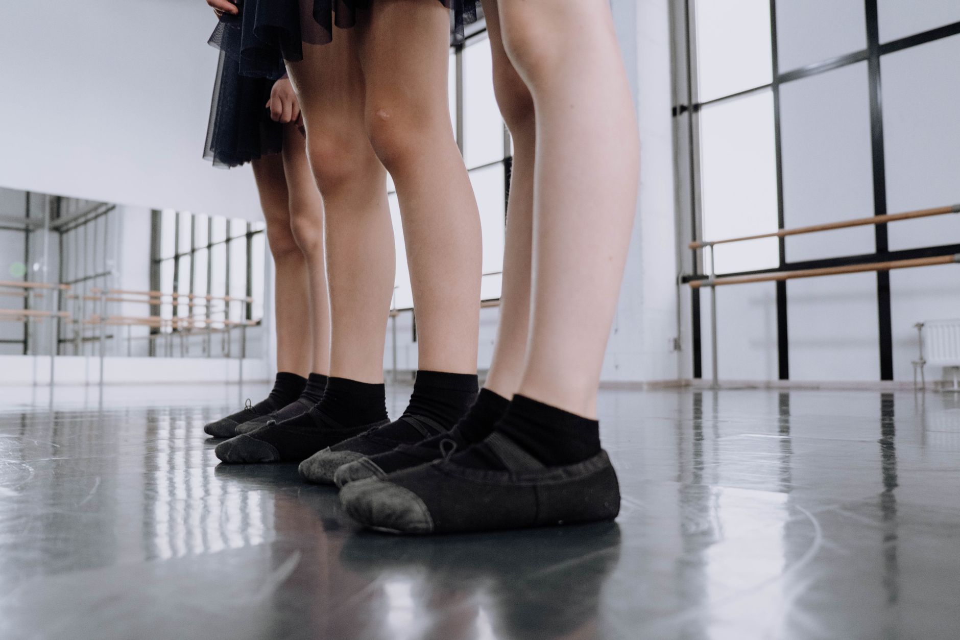 Close-up of ballet flat shoes on a neutral background