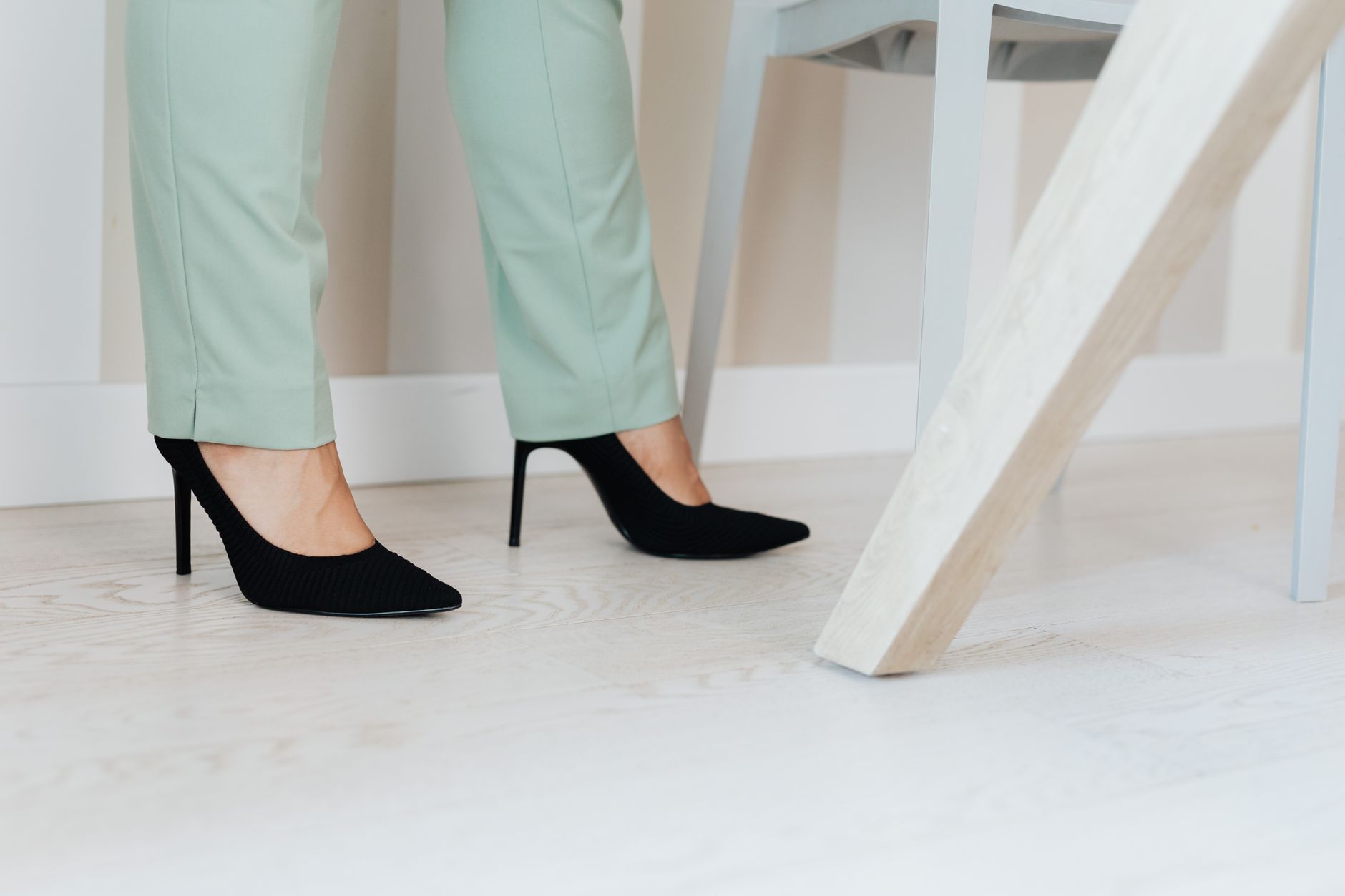 Close-up of chunky sole loafers worn with tailored trousers