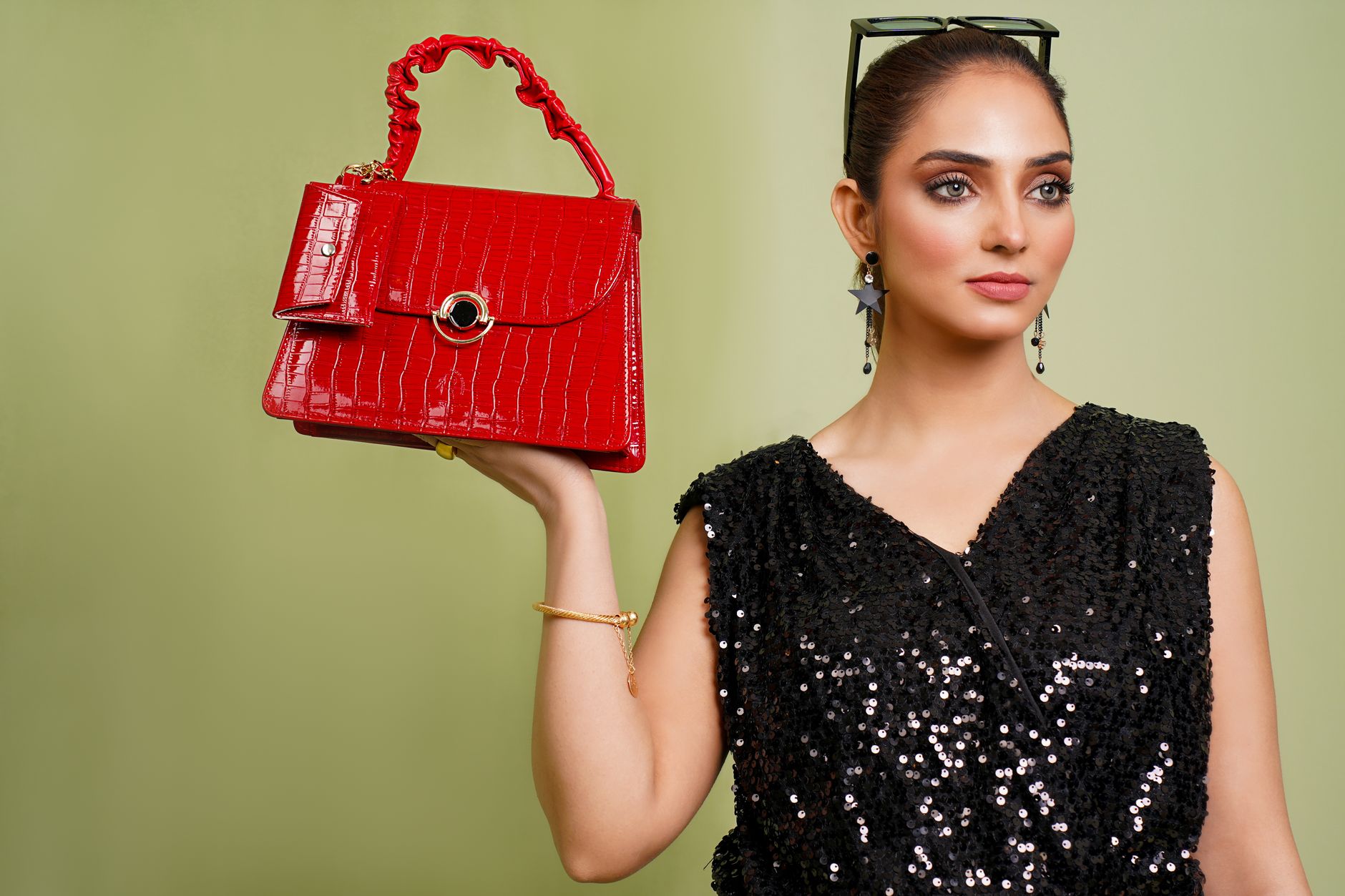 A minimalist leather bag photographed in an editorial context, emphasizing clean design and craftsmanship