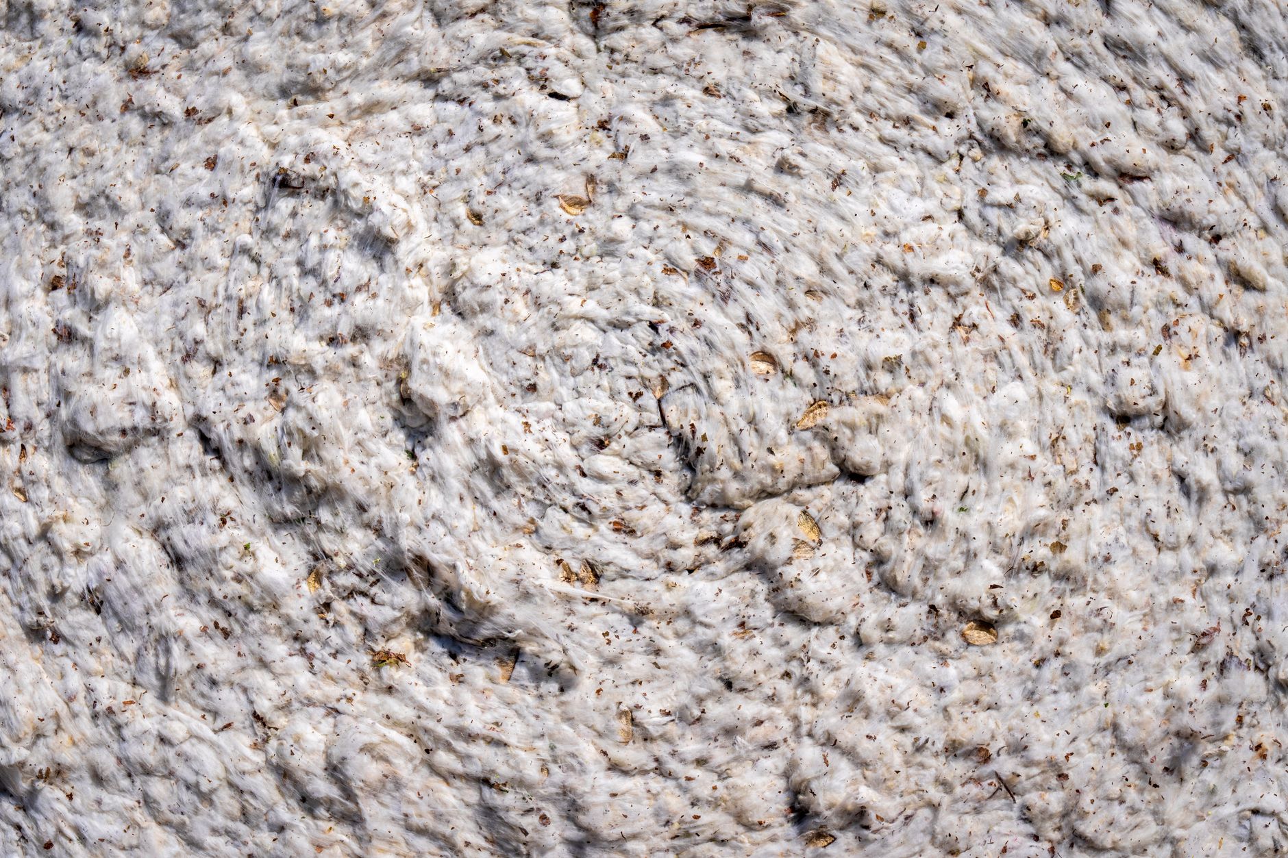 Close-up of woven linen fabric showing natural texture and grain