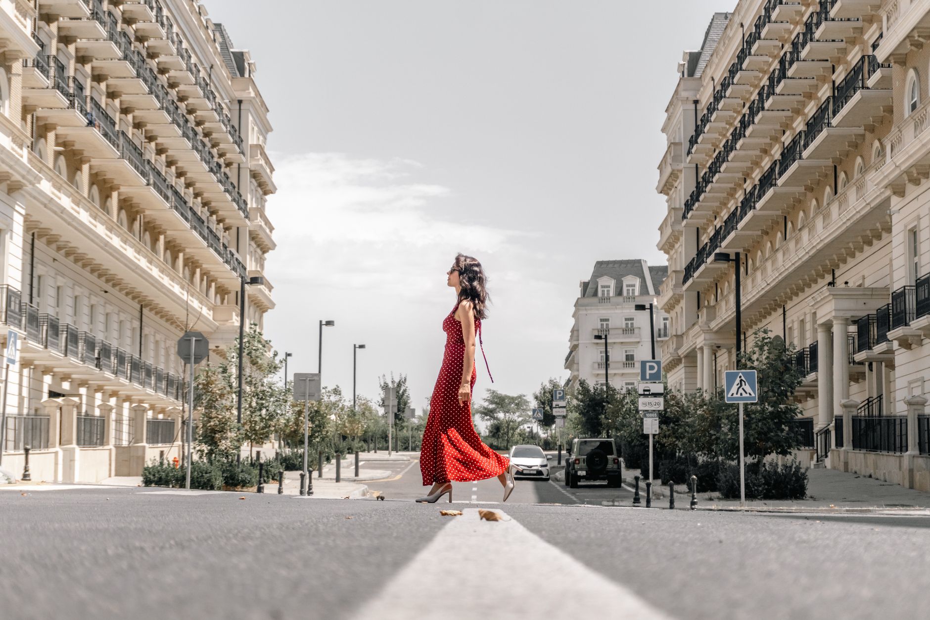 A polished street style outfit featuring tailored trousers and flat shoes
