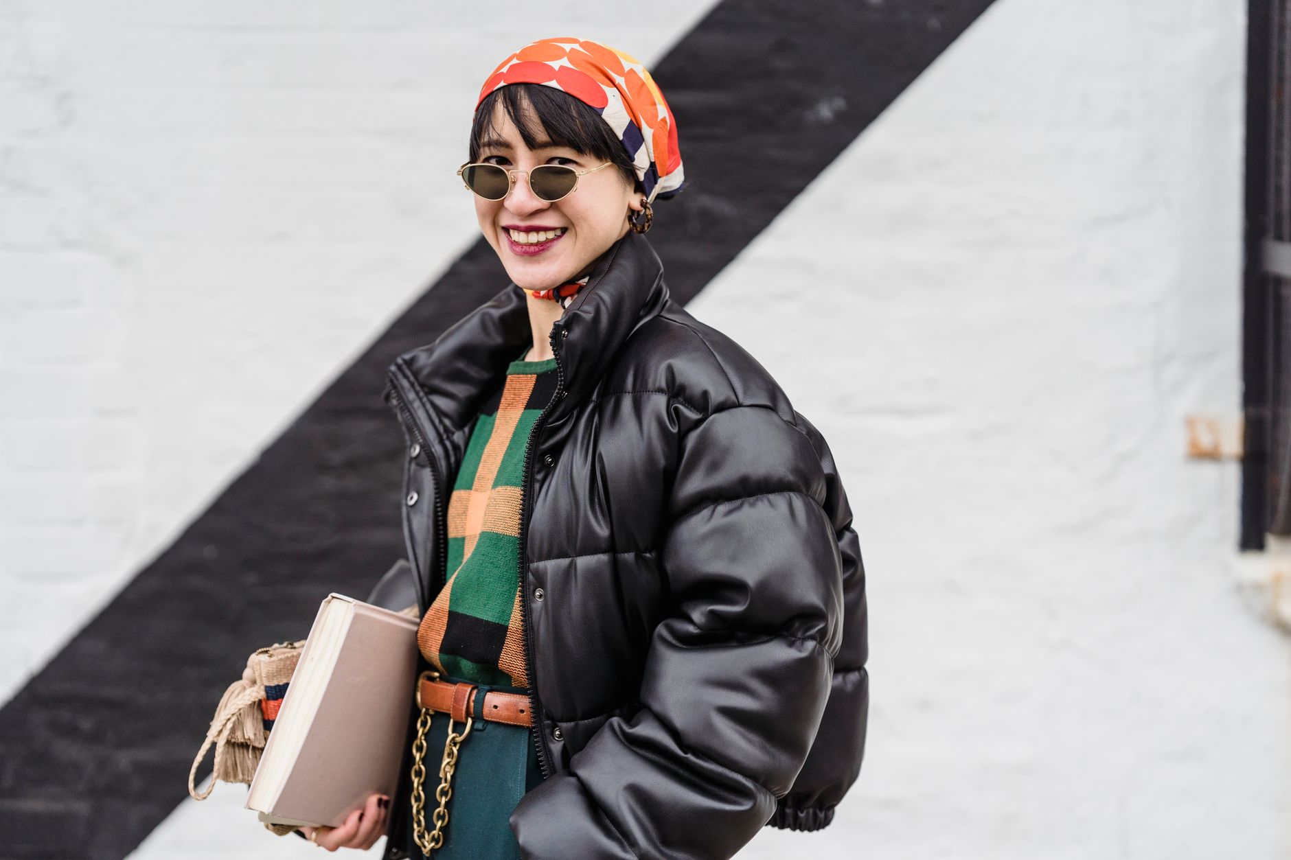Street style fashion featuring textured outerwear and layered clothing