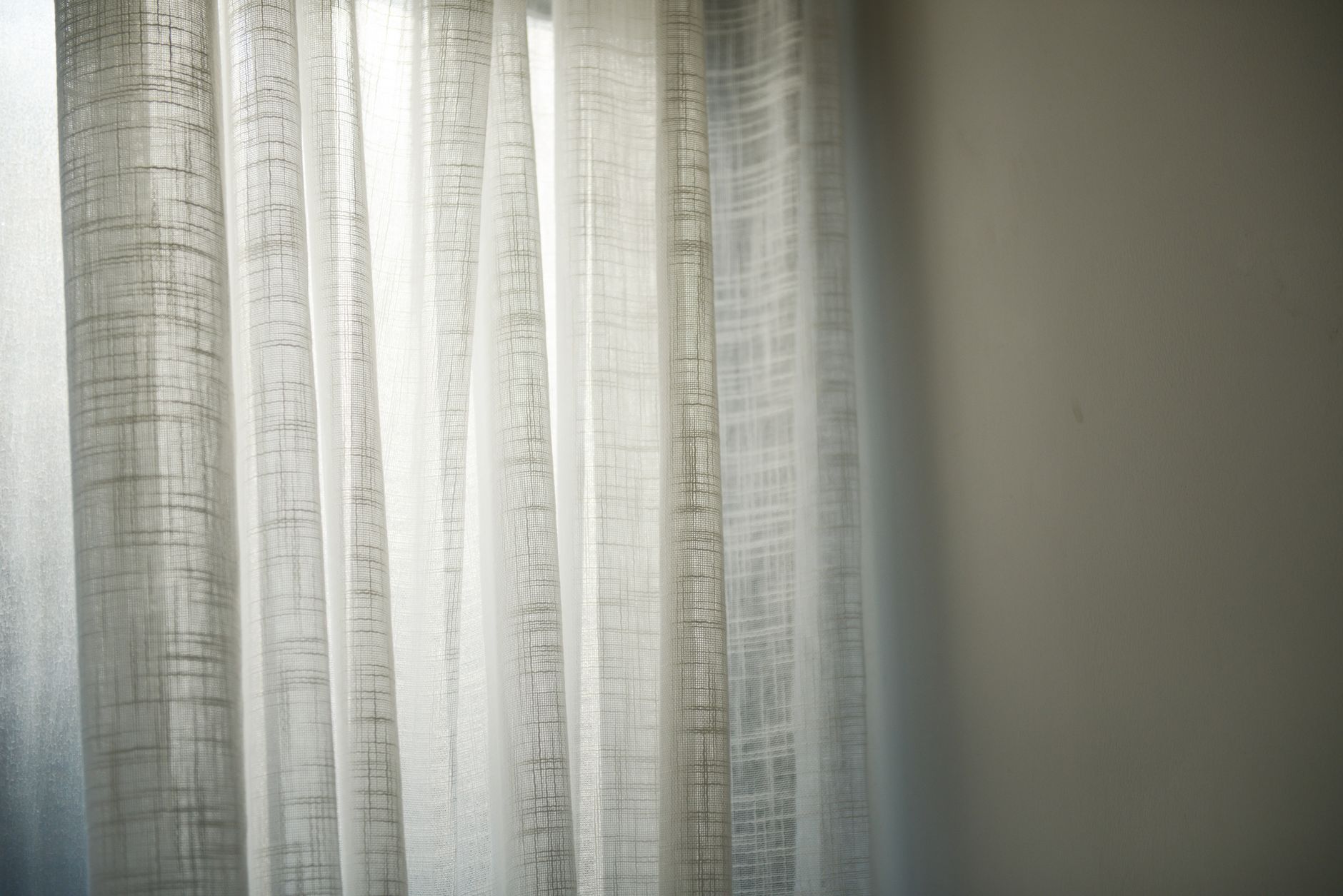 Close-up of sheer mesh fabric showing texture and layering potential