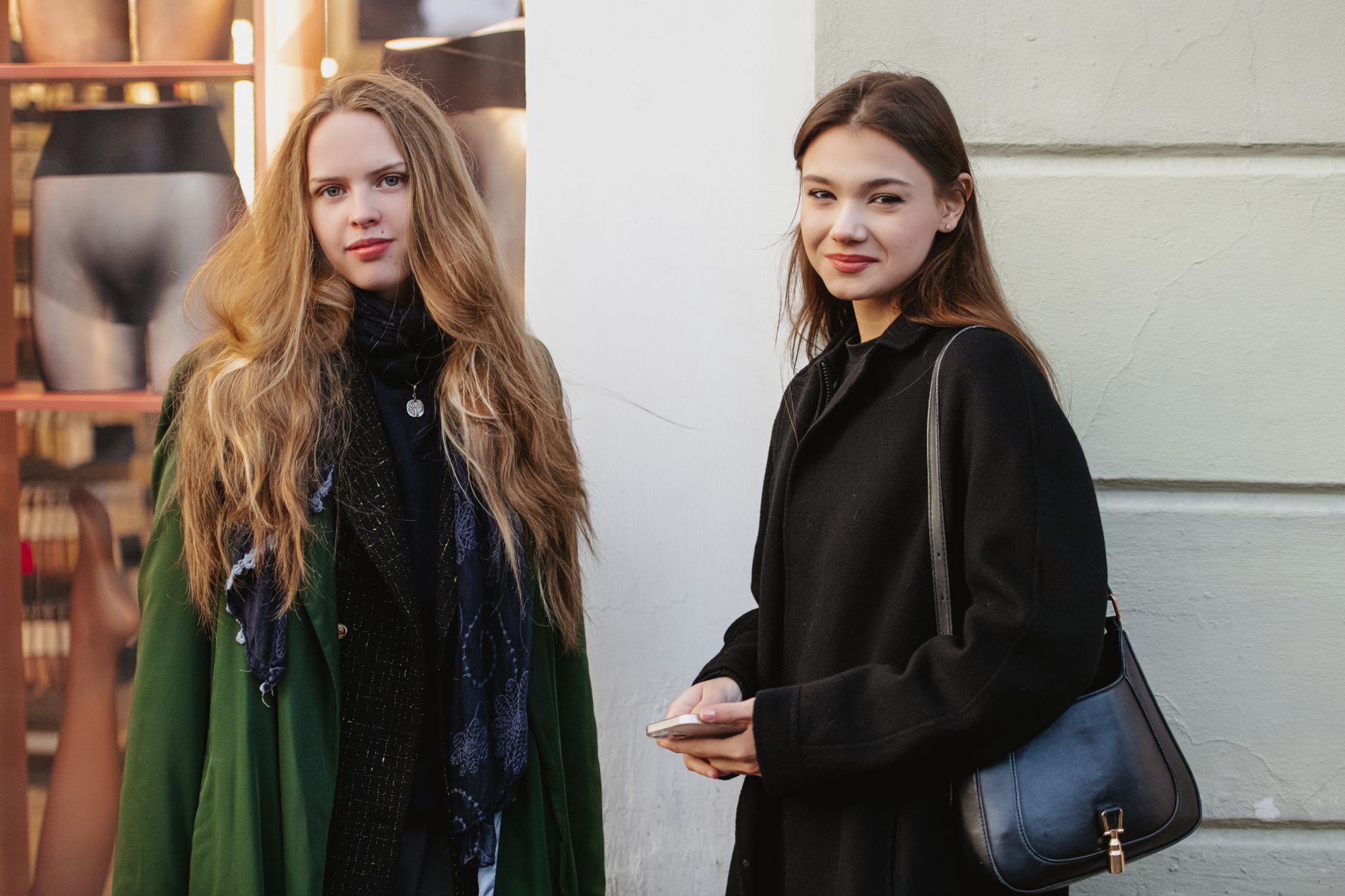 Street style look featuring padded loafers paired with wide-leg trousers and a blazer