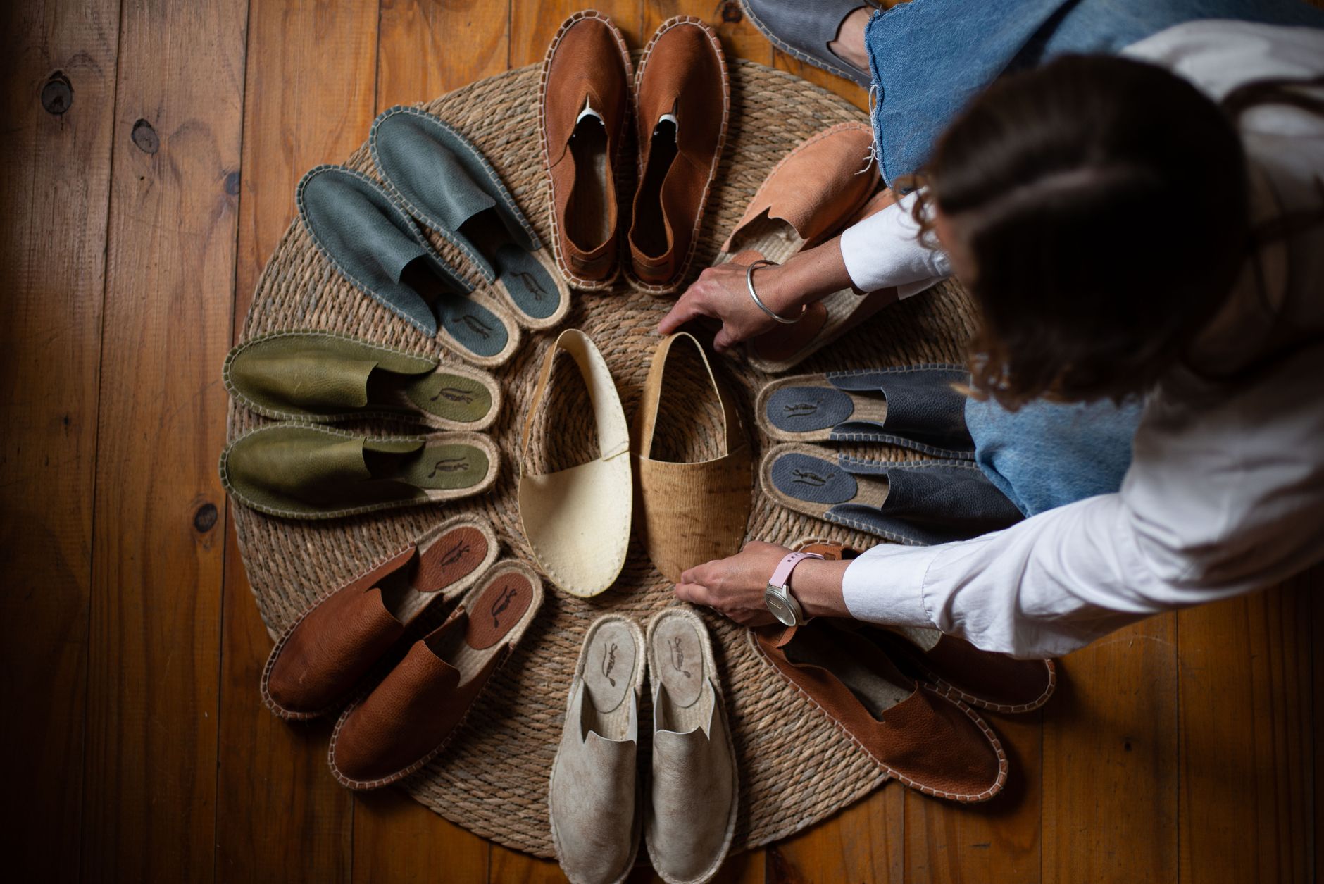 Flat leather Venetian loafers arranged on a neutral surface