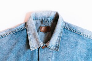 Close-up of contrast stitching along the seam of a structured blazer