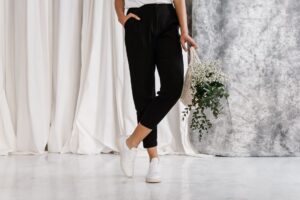 The Linen Trouser Is Quietly Edging Out the Cotton Wide-Leg Woman wearing relaxed wide-leg linen trousers in a neutral tone
