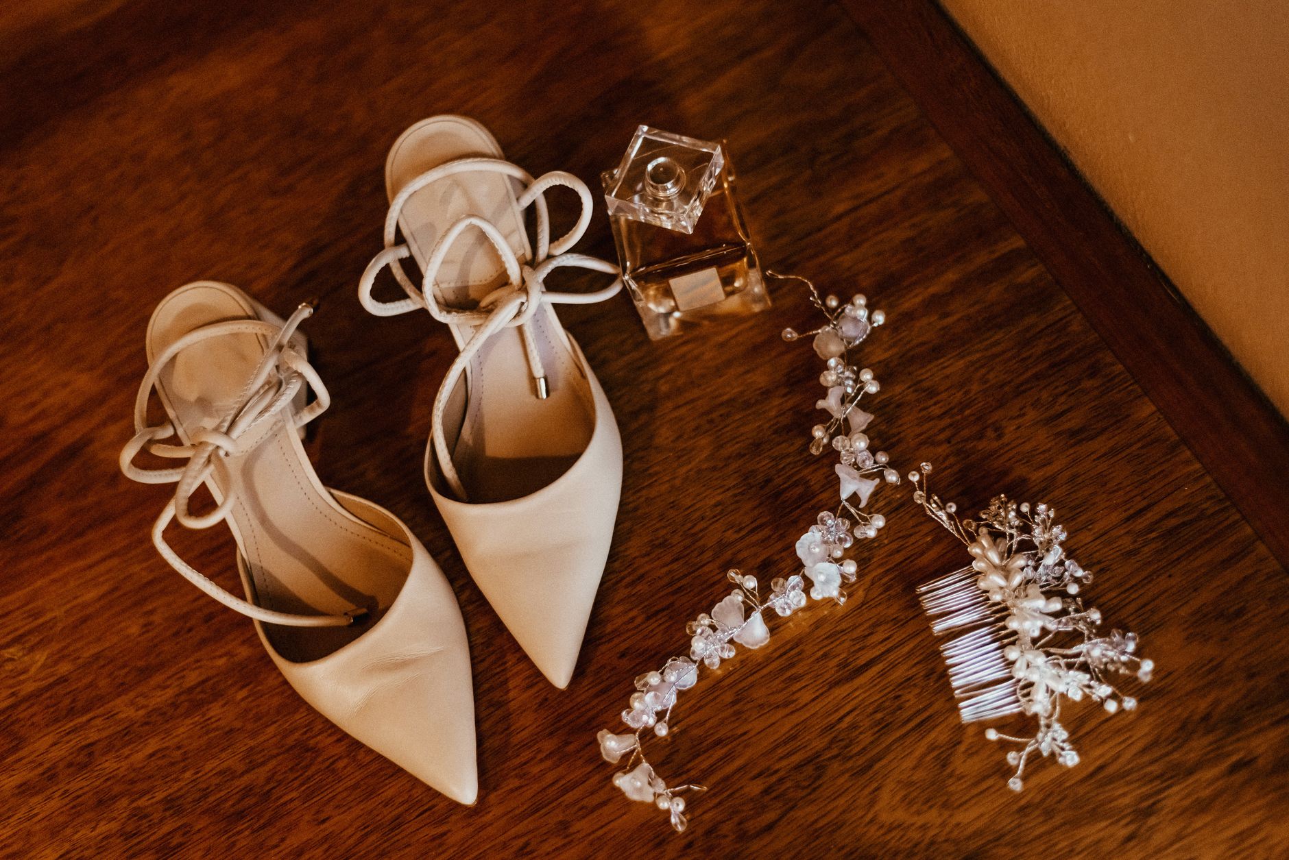 Arrangement of classic low-heeled women's shoes in neutral tones