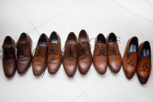 The Pointed-Toe Loafer Is Quietly Edging Out the Penny Loafer A pair of sleek pointed-toe loafers in tan leather displayed on a neutral background