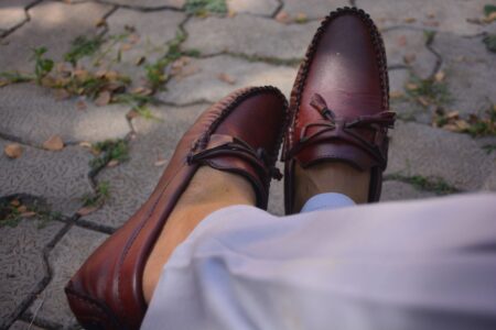 The Kitten Heel Loafer Is Quietly Edging Out the Block-Heel Flat Close-up of a pair of sleek kitten heel loafers on a neutral background