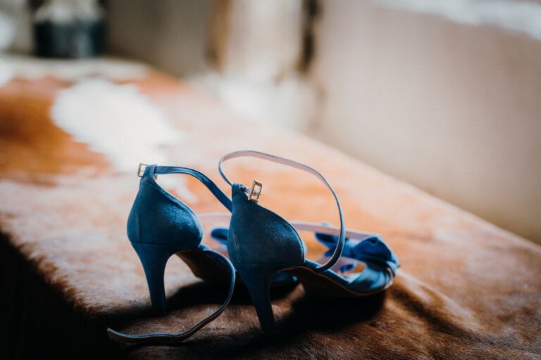 The Kitten Heel Mule Is Quietly Edging Out the Backless Loafer Close-up of a pair of neutral kitten heel mule shoes on a clean surface