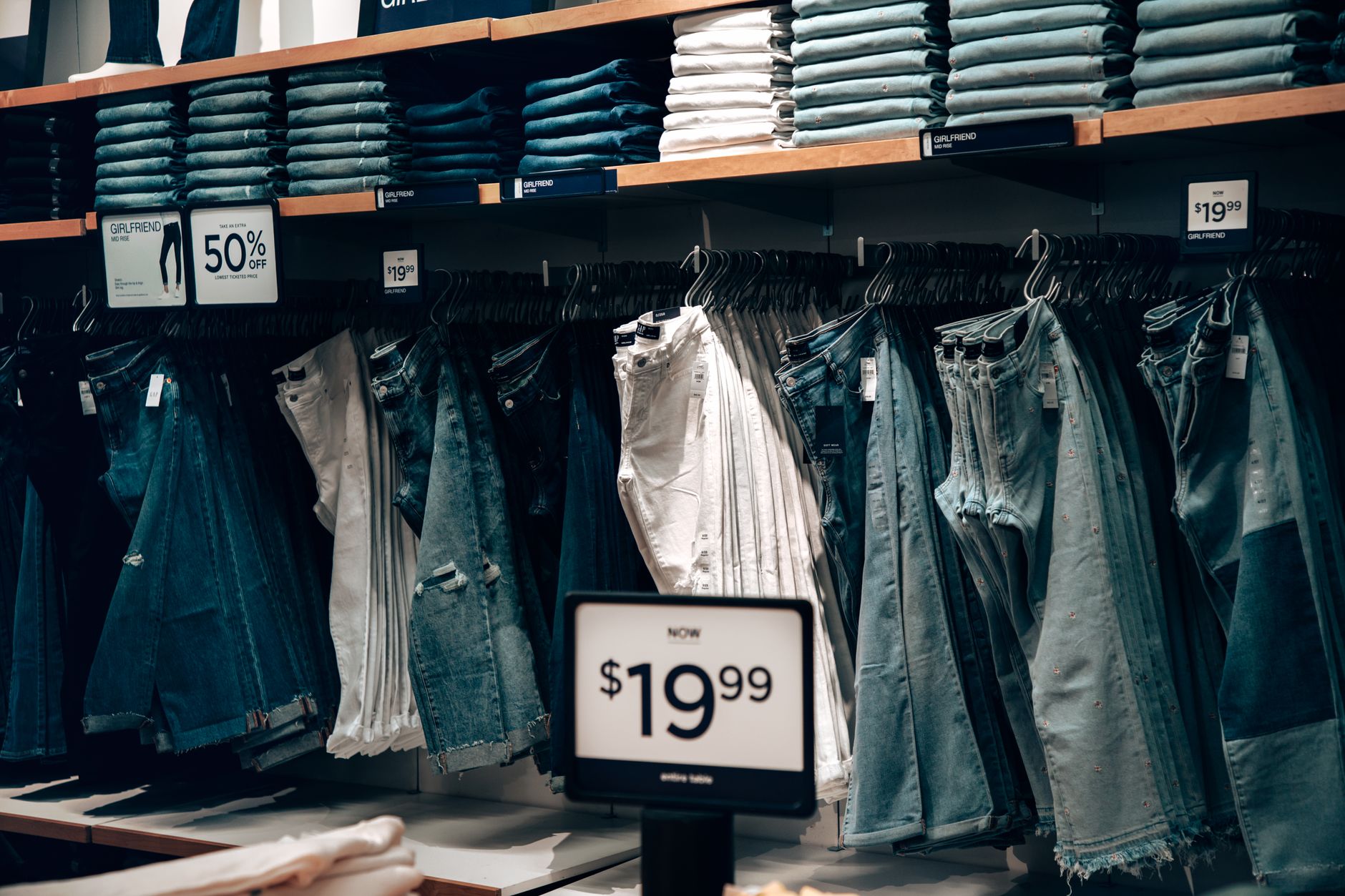 Clothing rack in a contemporary fashion retail store showing skirt styles