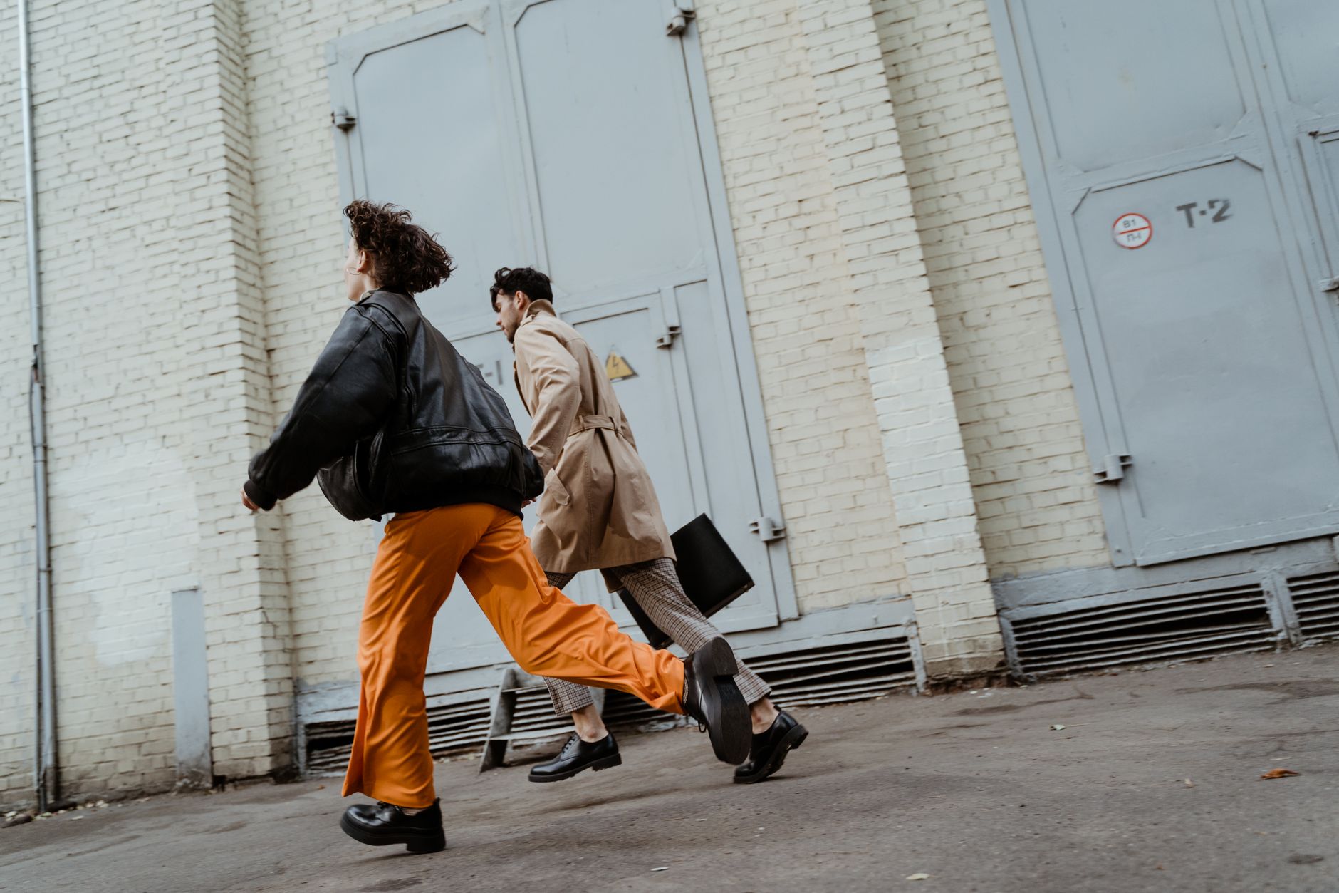 Models wearing statement footwear on a fashion runway