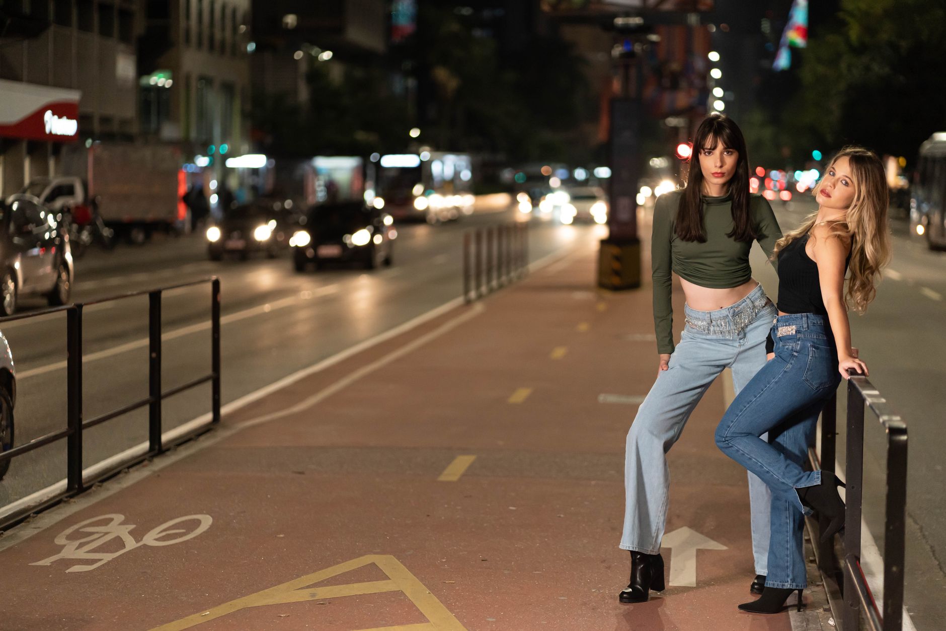 Women in casual street style outfits including utility-inspired clothing